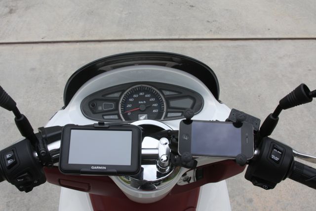 GPS and Iphone installed using various mounts from RAM.