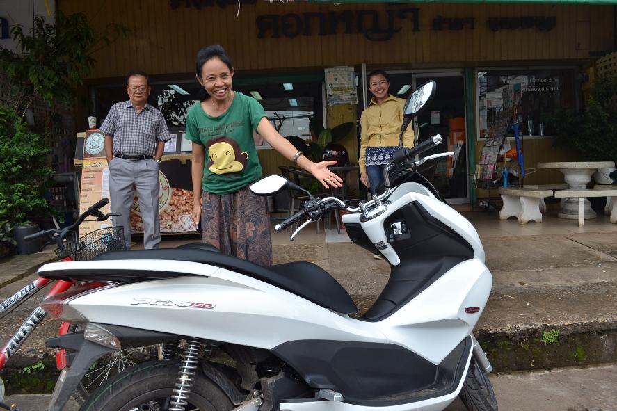 Outside the best iced coffee shop in Nakhon Phanom with the owner, Noi.